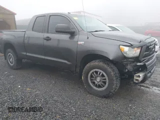 2012 Toyota Tundra 4WD Truck with VIN 5TFUY5F16CX260793, listed as a IAAI auction lot 41101239 with 202,339 mi miles. Bid and sale history available at carsss.com. Image 1.