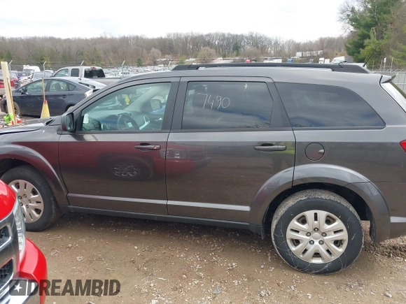2017 Dodge Journey SE with VIN 3C4PDCAB1HT529623, listed as a IAAI auction lot 42097490 with 175,411 mi miles and . Bid and sale history available at DreamBid. Image 15.