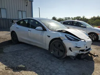 2023 Tesla Model 3 with VIN 5YJ3E1EA5PF567354, listed as a Copart auction lot 60964725 with 60,962 mi miles and Salvage title. Bid and sale history available at DreamBid. Image 4.