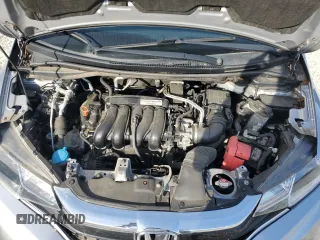 2019 Honda Fit LX z VIN 3HGGK5H46KM746970, wystawiony jako Copart lot #56474845 z przebiegiem 62 716 mil mil oraz Szkoda całkowita • Salvage title. Historia ofert i sprzedaży dostępna na DreamBid. Obrazek 11.