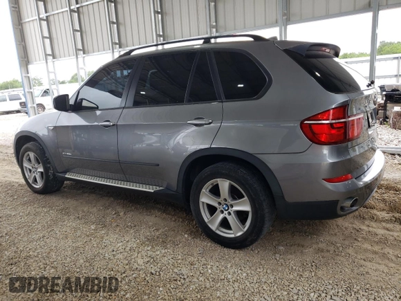 2012 BMW X5 35d with VIN 5UXZW0C53CL671564, listed as a Copart auction lot 60880715 with 154,401 mi miles and Clean title. Bid and sale history available at DreamBid. Image 2.