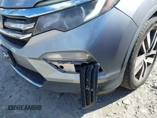 2017 Honda Pilot Touring with VIN 5FNYF6H94HB006873, listed as a IAAI auction lot 41618529 with 154,689 mi miles. Bid and sale history available at carsss.com. Image 6.