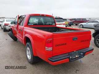 2004 Dodge Dakota Sport with VIN 1D7HL38KX4S657177, listed as a IAAI auction lot 41534575 with 38,802 mi miles. Bid and sale history available at carsss.com. Image 3.