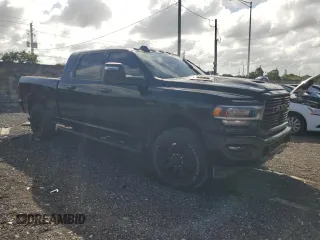 2024 Ram 2500 Laramie z VIN 3C6UR5NL5RG125812, wystawiony jako Copart lot #77317614 z przebiegiem Nie podano mil oraz Nie do naprawy • Non repairable. Historia ofert i sprzedaży dostępna na DreamBid. Obrazek 4.