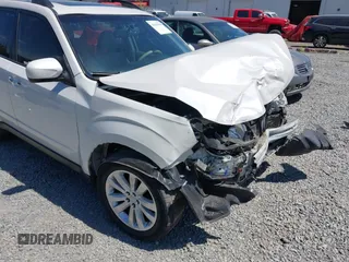 2012 Subaru Forester X Premium with VIN JF2SHADC2CH469660, listed as a IAAI auction lot 42639330 with 101,961 mi miles and . Bid and sale history available at DreamBid. Image 6.