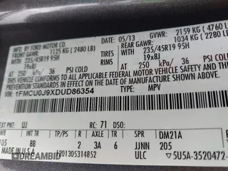 2013 Ford Escape Titanium with VIN 1FMCU0J9XDUD86354, listed as a IAAI auction lot 42420780 with 260,995 mi miles and . Bid and sale history available at DreamBid. Image 9.