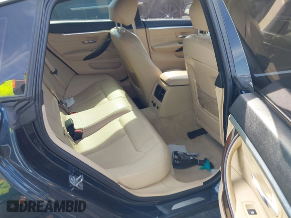 2016 BMW 4 Series 428i xDrive with VIN WBA4C9C56GG141089, listed as a IAAI auction lot 41587479 with 85,462 mi miles and . Bid and sale history available at DreamBid. Image 8.