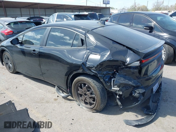 2023 Toyota Prius LE with VIN JTDACAAUXP3008201, listed as a IAAI auction lot 41824469 with 27,864 mi miles and . Bid and sale history available at carsss.com. Image 3.