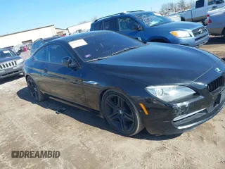 2012 BMW 6 Series 650i xDrive with VIN WBALX5C59CC894030, listed as a IAAI auction lot 41763126 with 115,562 mi miles. Bid and sale history available at carsss.com. Image 1.