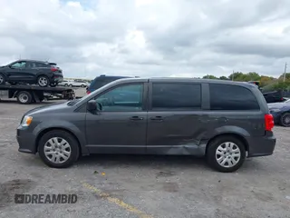 2019 Dodge Grand Caravan SE with VIN 2C4RDGBGXKR796974, listed as a IAAI auction lot 42008704 with 129,229 mi miles and . Bid and sale history available at DreamBid. Image 14.