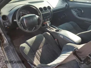 2000 Pontiac Firebird Firebird z VIN 2G2FS22K5Y2116520, wystawiony jako Copart lot #70697134 z przebiegiem 140 412 mil mil oraz Tytuł czysty. Historia ofert i sprzedaży dostępna na DreamBid. Obrazek 8.