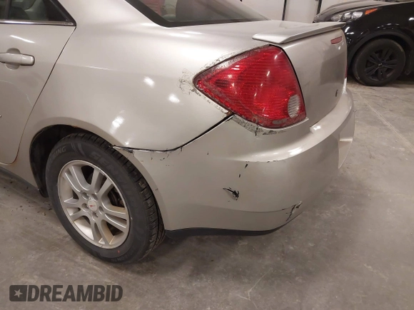 2006 Pontiac G6 1SV z VIN 1G2ZF55B264218234, wystawiony jako IAAI lot #41875165 z przebiegiem 226 618 mil mil oraz . Historia ofert i sprzedaży dostępna na DreamBid. Obrazek 12.