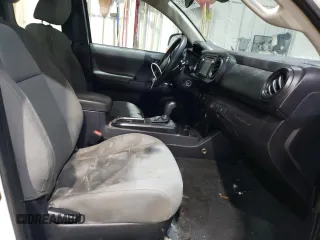 2018 Toyota Tacoma SR z VIN 5TFRX5GN7JX128181, wystawiony jako Copart lot #50954515 z przebiegiem 144 125 mil mil oraz Szkoda całkowita • Salvage title. Historia ofert i sprzedaży dostępna na DreamBid. Obrazek 10.
