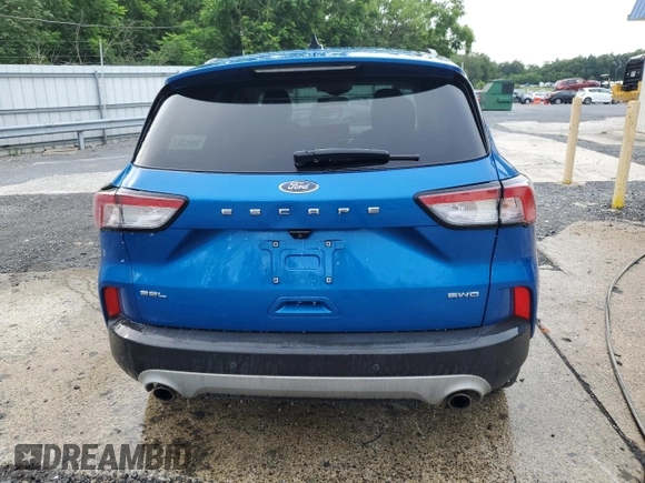 2021 Ford Escape SEL z VIN 1FMCU9H61MUA65237, wystawiony jako Copart lot #65338735 z przebiegiem 92 741 mil mil oraz Czysty tytuł • Clean title. Historia ofert i sprzedaży dostępna na DreamBid. Obrazek 6.