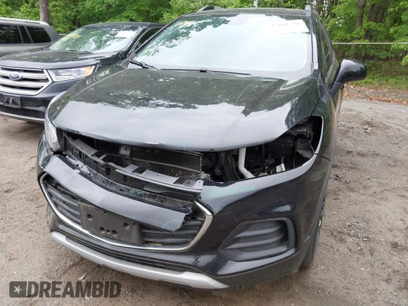 2021 Chevrolet Trax LT with VIN KL7CJLSB5MB322117, listed as a IAAI auction lot 42161568 with 63,344 mi miles and . Bid and sale history available at DreamBid. Image 6.