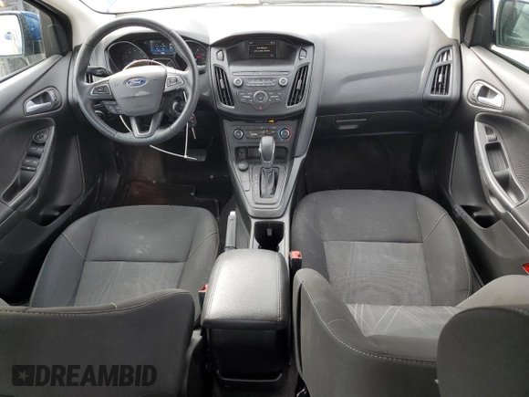 2018 Ford Focus SE z VIN 1FADP3F27JL260280, wystawiony jako Copart lot #54690975 z przebiegiem 73 322 mil mil oraz Szkoda całkowita • Salvage title. Historia ofert i sprzedaży dostępna na DreamBid. Obrazek 8.