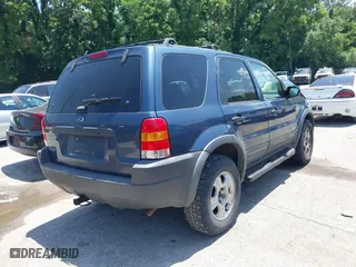 2001 Ford Escape XLT with VIN 1FMCU041X1KF10409, listed as a IAAI auction lot 39780383 with 246,336 mi miles. Bid and sale history available at carsss.com. Image 4.