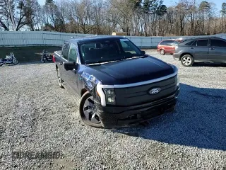 2024 Ford F-150 Lightning XLT with VIN 1FTVW3LK1RWG18473, listed as a Copart auction lot 86523084 with 6,824 mi miles and Salvage title. Bid and sale history available at DreamBid. Image 11.