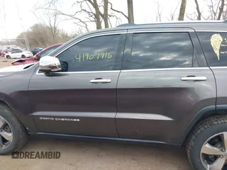 2014 Jeep Grand Cherokee Limited with VIN 1C4RJFBG3EC534827, listed as a IAAI auction lot 41907916 with 138,811 mi miles and . Bid and sale history available at DreamBid. Image 14.