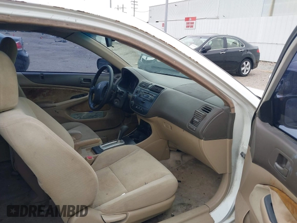 2005 Honda Civic Cpe LX with VIN 1HGEM22595L051891, listed as a IAAI auction lot 41271309 with 146,060 mi miles. Bid and sale history available at carsss.com. Image 5.