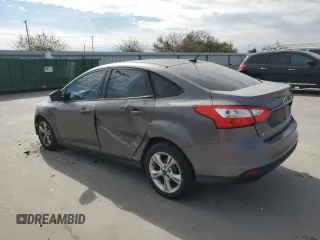 2013 Ford Focus SE z VIN 1FADP3F25DL149392, wystawiony jako Copart lot #82422434 z przebiegiem 169 525 mil mil oraz Szkody całkowita. Historia ofert i sprzedaży dostępna na DreamBid. Obrazek 2.
