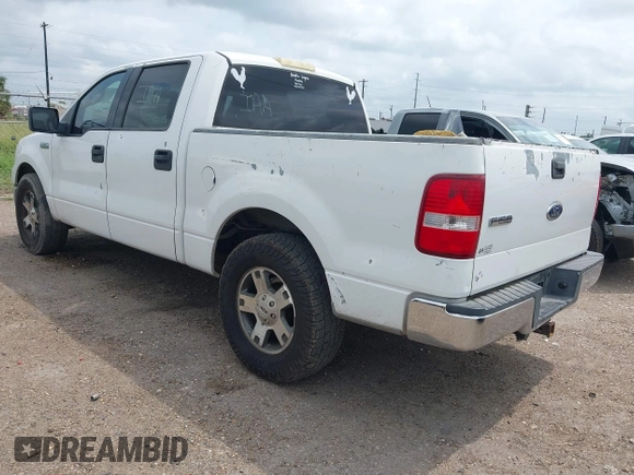 2004 Ford F-150 XLT with VIN 1FTPW12534KD74981, listed as a IAAI auction lot 42086802 with 323,592 mi miles. Bid and sale history available at carsss.com. Image 3.