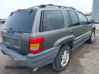 2003 Jeep Grand Cherokee Laredo with VIN 1J4GW48S83C553535, listed as a IAAI auction lot 42387097 with 360,465 mi miles and . Bid and sale history available at DreamBid. Image 4.
