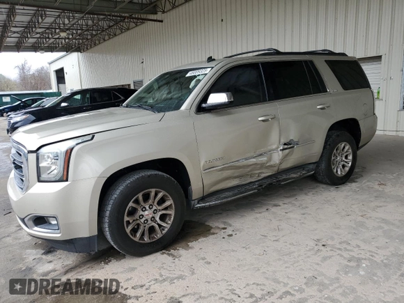 2015 GMC Yukon SLE with VIN 1GKS1AKC5FR120713, listed as a Copart auction lot 48009325 with 133,372 mi miles and Salvage Title. Bid and sale history available at carsss.com. Image 1.