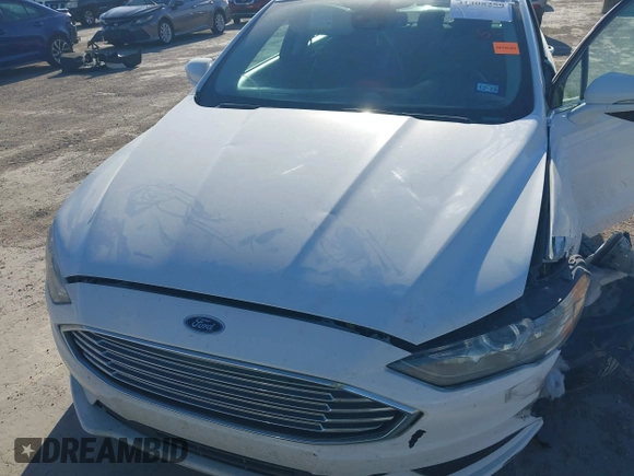 2018 Ford Fusion SE with VIN 3FA6P0H71JR262575, listed as a IAAI auction lot 41408259 with 96,624 mi miles and . Bid and sale history available at DreamBid. Image 10.