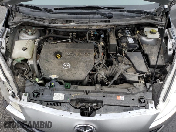 2012 Mazda 5 Touring with VIN JM1CW2CL8C0121599, listed as a Copart auction lot 50520895 with 131,948 mi miles and Salvage title. Bid and sale history available at DreamBid. Image 14.