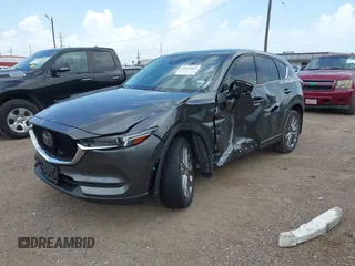 2021 Mazda CX-5 Grand Touring with VIN JM3KFBDM2M0431484, listed as a IAAI auction lot 42547665 with 34,757 mi miles and . Bid and sale history available at DreamBid. Image 18.