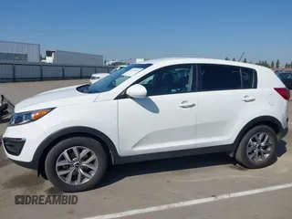 2015 Kia Sportage LX with VIN KNDPB3AC9F7715443, listed as a IAAI auction lot 42183933 with 115,211 mi miles and . Bid and sale history available at carsss.com. Image 14.