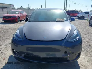 2023 Tesla Model Y Long Range with VIN 7SAYGDEE1PA203937, listed as a IAAI auction lot 41814421 with 9,138 mi miles. Bid and sale history available at carsss.com. Image 11.