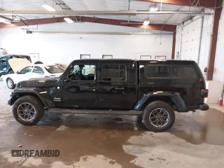 2020 Jeep Gladiator Overland with VIN 1C6HJTFG5LL140142, listed as a IAAI auction lot 42452310 with 111,884 mi miles and . Bid and sale history available at DreamBid. Image 14.