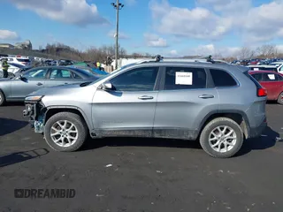 2014 Jeep Cherokee Altitude with VIN 1C4PJMCB5EW167961, listed as a IAAI auction lot 41660440 with 88,705 mi miles and . Bid and sale history available at DreamBid. Image 14.