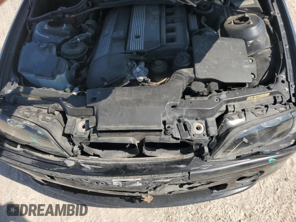 2005 BMW 3 Series 330i with VIN WBAEV53405KM43213, listed as a Copart auction lot 74597414 with 182,881 mi miles and Salvage Title. Bid and sale history available at carsss.com. Image 11.