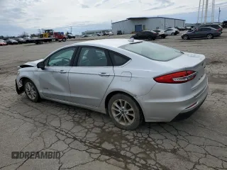 2019 Ford Fusion Hybrid SE with VIN 3FA6P0LU1KR242759, listed as a Copart auction lot 50991255 with 163,440 mi miles and Clean Title. Bid and sale history available at carsss.com. Image 2.