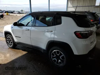 2024 Jeep Compass Trailhawk z VIN 3C4NJDDN1RT144852, wystawiony jako Copart lot #59986935 z przebiegiem 33 629 mil mil oraz Czysty tytuł • Clean title. Historia ofert i sprzedaży dostępna na DreamBid. Obrazek 2.