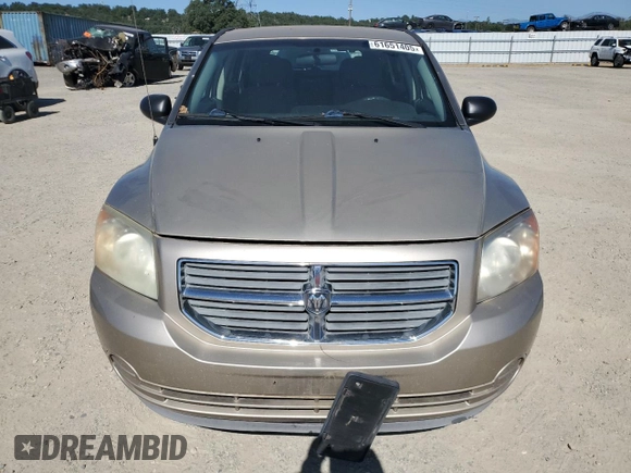 2010 Dodge Caliber SXT z VIN 1B3CB4HA7AD571525, wystawiony jako Copart lot #61651405 z przebiegiem 188 383 mil mil oraz Czysty tytuł • Clean title. Historia ofert i sprzedaży dostępna na DreamBid. Obrazek 5.