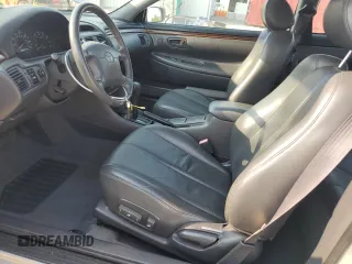 2000 Toyota Solara SE z VIN 2T1CF28P5YC267645, wystawiony jako Copart lot #60543605 z przebiegiem 58 938 mil mil oraz Szkoda całkowita • Salvage title. Historia ofert i sprzedaży dostępna na DreamBid. Obrazek 7.