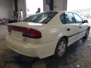 2000 Subaru Legacy L with VIN 4S3BE6352Y7213443, listed as a IAAI auction lot 42019409 with 208,785 mi miles and . Bid and sale history available at DreamBid. Image 4.
