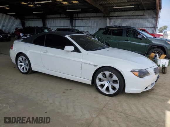 2006 BMW 6 Series 650Ci z VIN WBAEK134X6CN77921, wystawiony jako Copart lot #54093355 z przebiegiem 162 363 mil mil oraz Czysty tytuł • Clean title. Historia ofert i sprzedaży dostępna na DreamBid. Obrazek 4.