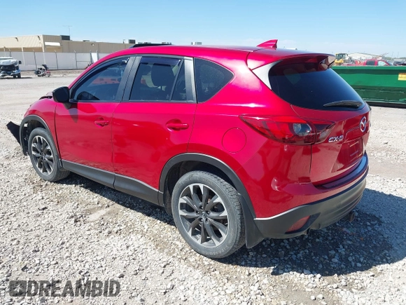 2016 Mazda CX-5 Grand Touring with VIN JM3KE2DYXG0652017, listed as a IAAI auction lot 42041158 with 95,946 mi miles and . Bid and sale history available at DreamBid. Image 3.