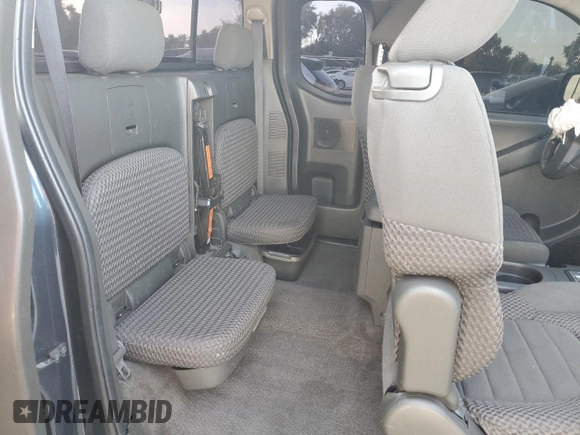 2014 Nissan Frontier SV z VIN 1N6AD0CU4EN744201, wystawiony jako Copart lot #79201624 z przebiegiem 126 552 mil mil oraz Szkoda całkowita • Salvage title. Historia ofert i sprzedaży dostępna na DreamBid. Obrazek 10.