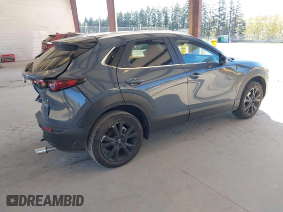 2024 Mazda CX-30 S Preferred with VIN 3MVDMBCM0RM641917, listed as a IAAI auction lot 42058344 with 3,005 mi miles and . Bid and sale history available at DreamBid. Image 4.