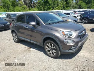 2016 FIAT 500X Trekking with VIN ZFBCFYCT0GP338212, listed as a Copart auction lot 51843725 with 56,157 mi miles and Salvage title. Bid and sale history available at DreamBid. Image 4.