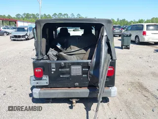 2005 Jeep Wrangler Unlimited with VIN 1J4FA44S25P385421, listed as a IAAI auction lot 42039381 with 1 mi miles. Bid and sale history available at carsss.com. Image 15.