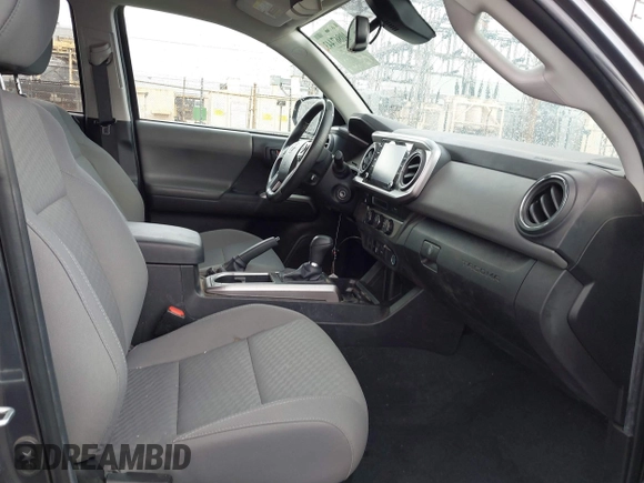 2022 Toyota Tacoma SR5 with VIN 3TMBZ5DN2NM034561, listed as a IAAI auction lot 40867443 with 51,728 mi miles and . Bid and sale history available at DreamBid. Image 5.