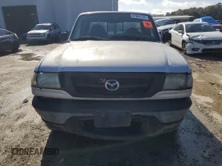 2003 Mazda B-Series 2WD Truck SX with VIN 4F4YR12DX3TM03461, listed as a Copart auction lot 87044124 with 214,552 mi miles and Clean Title. Bid and sale history available at carsss.com. Image 5.