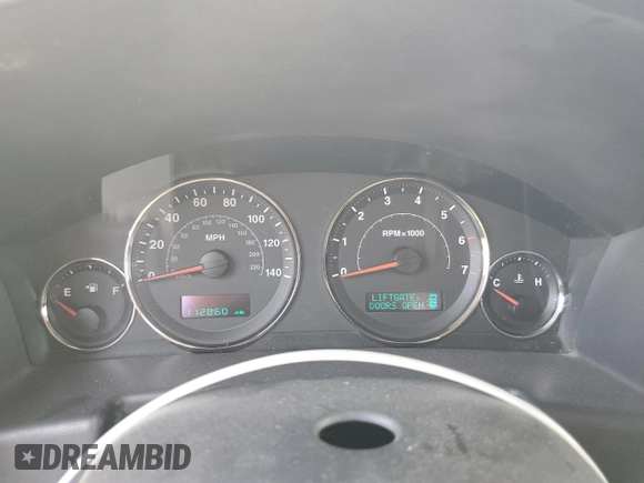 2006 Jeep Commander Limited with VIN 1J8HG58296C170911, listed as a Copart auction lot 59883355 with 112,860 mi miles and Salvage title. Bid and sale history available at DreamBid. Image 9.